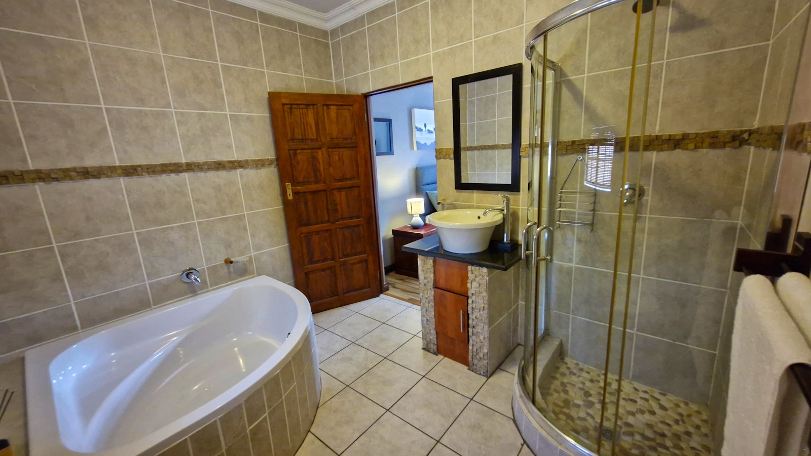 Bathroom with corner bath