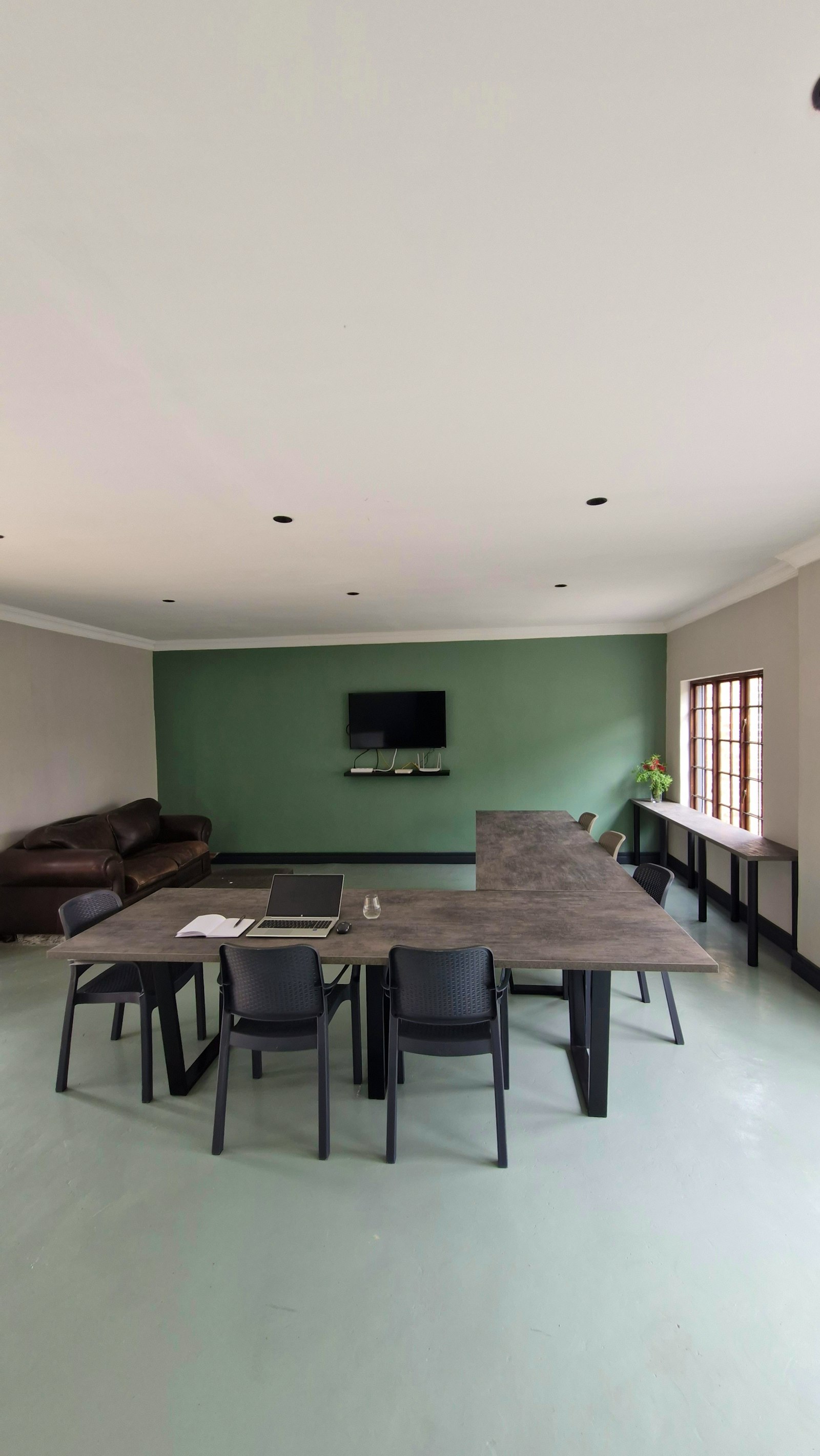 Spacious communal lounge and dining area
